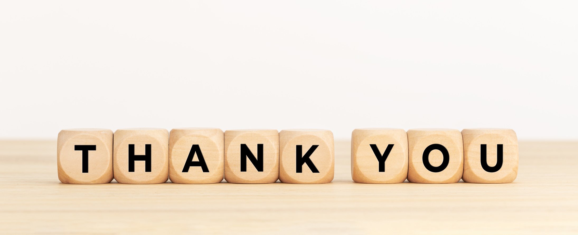 Wooden Blocks on Table with Thank You Text